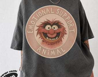 T-Shirt mit emotionalem Begleittier, Retro-Grafik mit wildem Puppengesicht