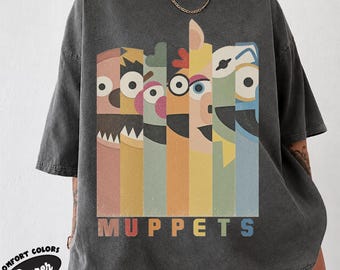 Retro-T-Shirt mit Puppengesichtern, vertikalen Streifen und Used-Look in Pastellfarben