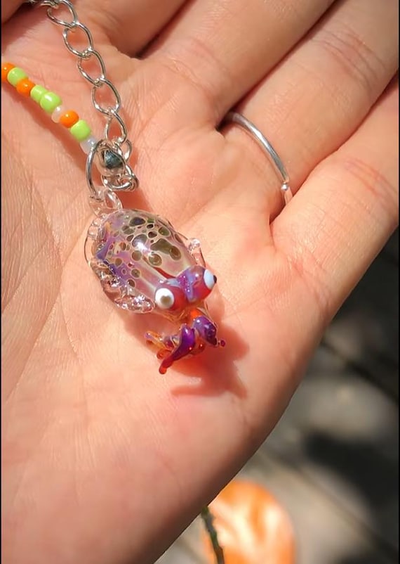 A hand-blown glass octopus sculpture where no two are identical — the kind of art piece that stops guests mid-conversation.