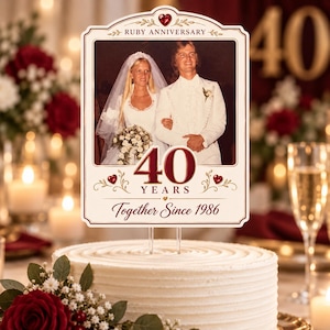 May include: A rectangular cake topper featuring a vintage wedding photograph of a couple in white attire. The design includes the text "RUBY ANNIVERSARY", "40 YEARS", and "Together Since 1986", accented with red heart graphics and gold flourishes.