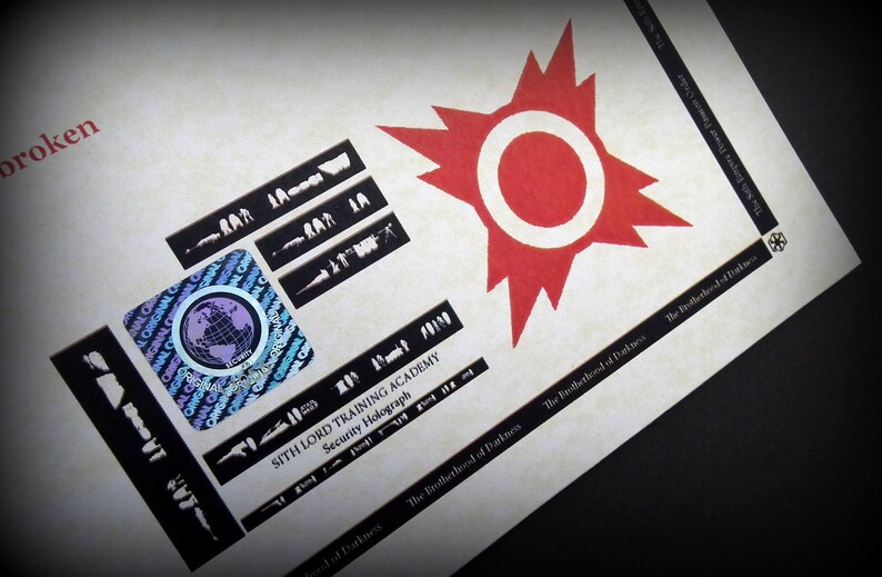 May include: A close-up of a printed card with a red starburst design and the text "Sith Lord Training Academy Security Holograph". The card also features a black and white globe graphic and the text "The Brotherhood of Darkness".