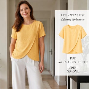 May include: A yellow linen wrap top with short sleeves and a rounded neckline. The text on the image reads: LINEN WRAP TOP Sewing Pattern, PDF, A4 - A0 - US LETTER, SIZES XS - XXL. The top features a layered front panel design with a curved hem.