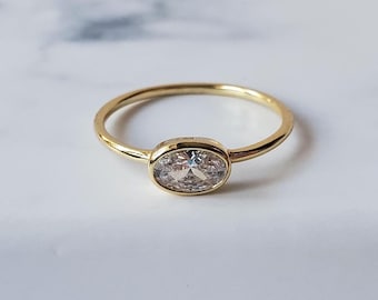 Oval cubic zirconia solitaire ring, gold vermeil, april birthstone