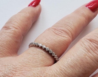 Sterling silver and cubic zirconia stud band ring