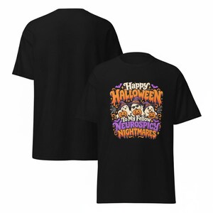 May include: A black short-sleeved t-shirt featuring a colourful graphic with three ghosts wearing purple witch hats and holding pumpkins. The text reads Happy Halloween To My Fellow Neurospicy Nightmares in orange, white, and purple lettering.