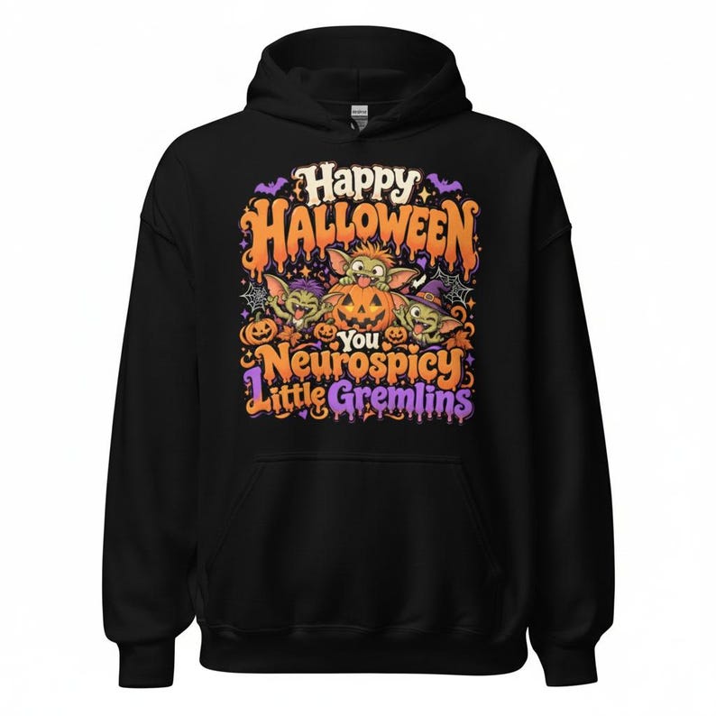 May include: A black hooded sweatshirt featuring a colourful graphic print with the text Happy Halloween You Neurospicy Little Gremlins. The design includes three green creatures, orange jack-o'-lanterns, purple bats, and spiderwebs.