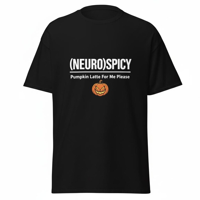 May include: A black short-sleeved t-shirt featuring the white text (NEURO)SPICY with a line underneath, followed by the text Pumpkin Latte For Me Please and a graphic of an orange jack-o'-lantern pumpkin with a jagged, smiling face.