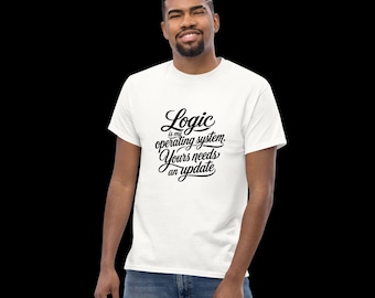 May include: A white short-sleeved t-shirt featuring black cursive text on the chest that reads: Logic is my operating system. Yours needs an update. The shirt has a crew neckline and is paired with blue denim jeans against a black background.