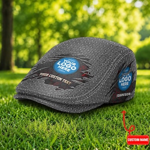 May include: A grey flat cap featuring a diamond plate metal texture pattern with a distressed tear effect. The design includes blue circular emblems with the text YOUR LOGO HERE and the custom text YOUR CUSTOM TEXT and JOHNSON printed on the side.
