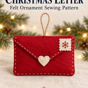 May include: A red felt envelope ornament with white stitching, a cream-coloured heart applique, and a cream-coloured square stamp with a red snowflake. The text reads: CHRISTMAS LETTER Felt Ornament Sewing Pattern. Beginner Friendly • Full-Size A4 Templates.