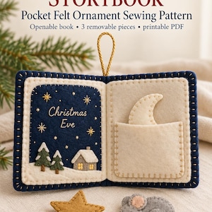 May include: A felt Christmas Eve storybook ornament sewing pattern featuring an open book with a dark blue night sky scene, a house, and trees on the left page, and a pocket with a moon on the right. Includes a gold star and a grey mouse.