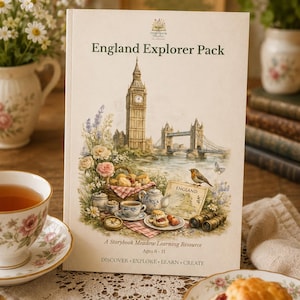May include: A rectangular England Explorer Pack learning resource book featuring an illustration of Big Ben, Tower Bridge, a picnic with tea and scones, a robin, and a map. The cover text reads England Explorer Pack, A Storybook Meadow Learning Resource, Ages 6-11, DISCOVER, EXPLORE, LEARN, CREATE.