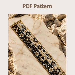 May include: A beaded bracelet featuring a geometric pattern in black, white, and gold seed beads with gold-toned metal end bars. The text above the bracelet reads Peyote Brancet PDF Pattern, indicating a digital design guide for this jewelry item.
