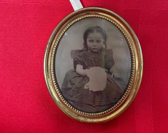 INSTANT ANCESTOR! Antique photograph of young girl in oval frame, suitable for hanging