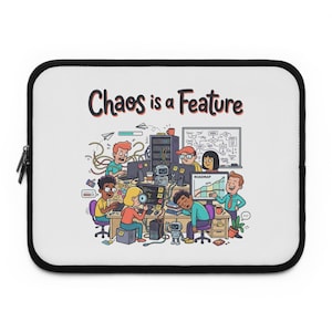 May include: A white laptop sleeve with black trim featuring a colorful cartoon illustration of a busy office environment with computers, robots, and people, with the text "Chaos is a Feature" printed in a bold, dark font at the top center.