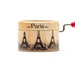 Little Eiffel Tower music box with a hand cranked mechanism 