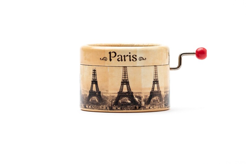 Little Eiffel Tower music box with a hand cranked mechanism 