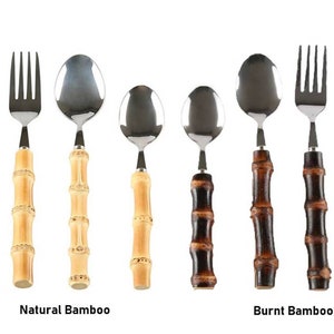 May include: A set of stainless steel cutlery with bamboo-style handles. The image shows knives, forks, and spoons with two handle variations: natural bamboo and burnt bamboo. The text at the bottom reads "Natural Bamboo" and "Burnt Bamboo."