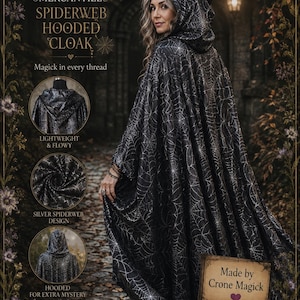 May include: A black hooded cloak featuring a silver spiderweb pattern throughout. The garment includes a hood and a flowy design. Text on the image reads: MOUNTAIN CRONE MERCANTILE, SPIDERWEB HOODED CLOAK, Magick in every thread, LIGHTWEIGHT & FLOWY, SILVER SPIDERWEB DESIGN, HOODED FOR EXTRA MYSTERY, Made by Crone Magick.