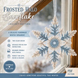 May include: A crochet snowflake ornament featuring a two-color design in light blue and white. The text reads: Frosted Halo Snowflake Crochet Pattern, A delicate handmade winter ornament, Two-color design, Detailed step-by-step instructions, Beginner friendly with photos, Perfect for gifts, decor & holidays, Handmade with love, PDF Pattern, Create something beautiful this winter.