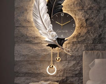 Modern feather wall clock, contemporary resin art decor with ambient LED lighting, abstract luxury home statement piece