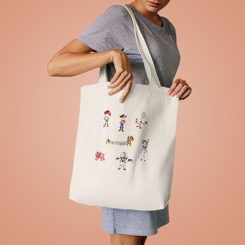 Toy Story Characters Tote Bag | Woody Buzz Jessie Bo Peep Alien Tote image 1