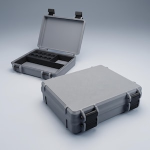 May include: Two rectangular grey hard-shell cases with black latches. One case is closed, while the other is open, revealing a black interior foam insert with ten circular cutouts and two rectangular compartments for organised storage.