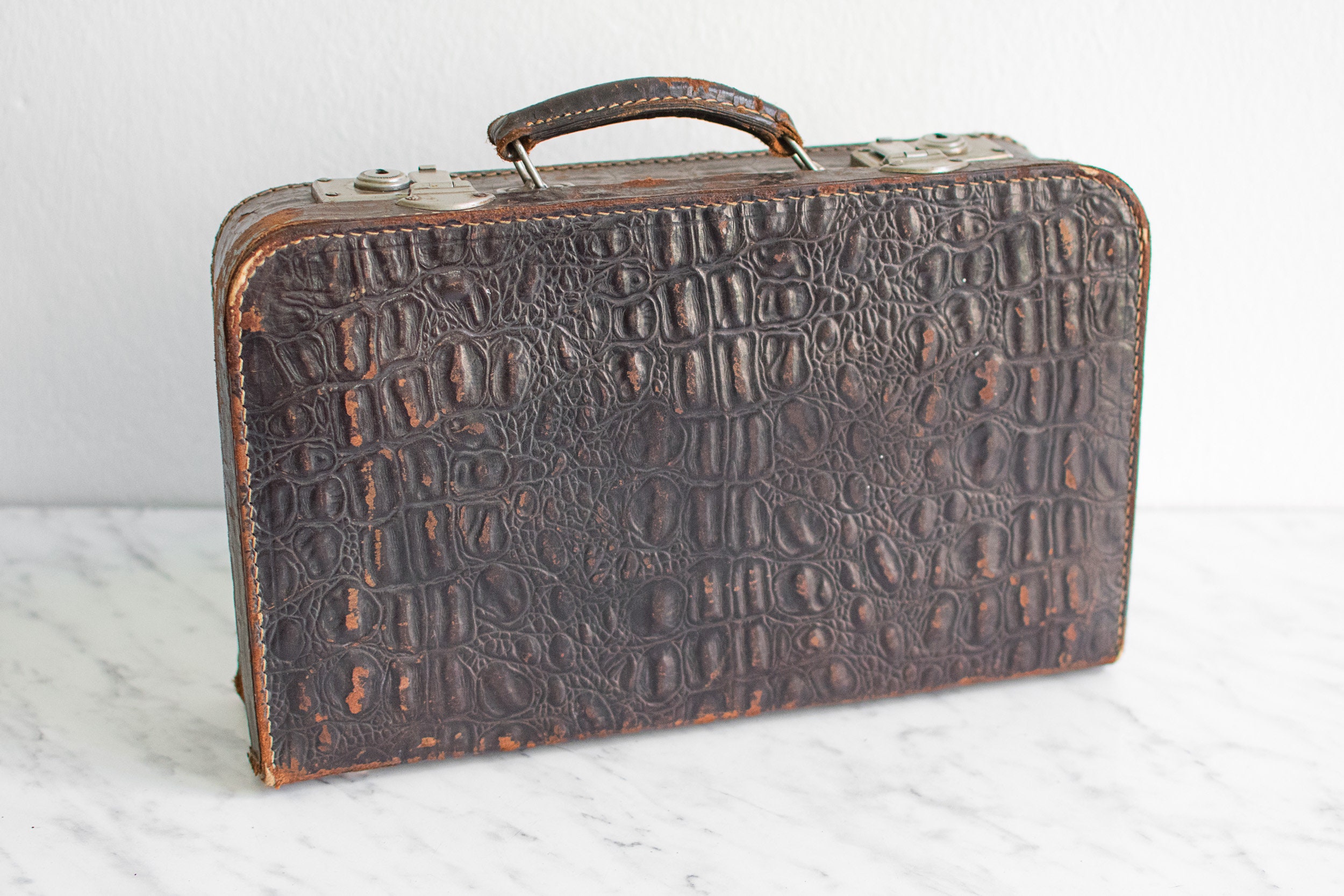 crocodile leather suitcase