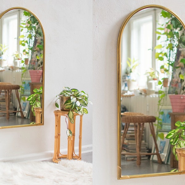 Arched brass mirror