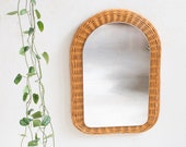 Curved mirror made of rattan