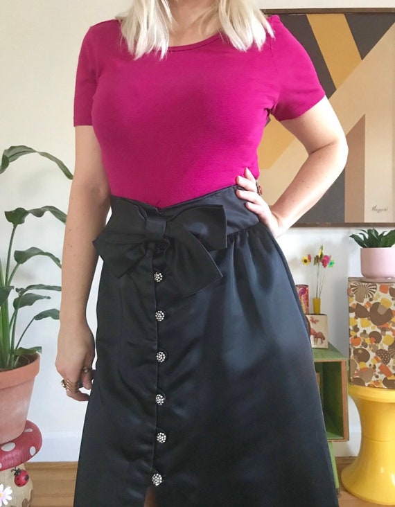 Black flowy skirt 60s hot sale