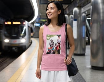 Unisex graphic tank featuring vibrant tropical collage, edgy feminist aesthetic, bold wearable art, original colorful design
