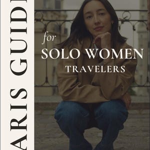 May include: A digital guide titled PARIS GUIDE for SOLO WOMEN TRAVELERS featuring a person in a brown jacket and blue jeans. The text includes A thoughtful & safe experience curated by @iamsoldana. The design has a vertical white sidebar.