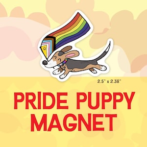 May include: A magnet featuring a cartoon dog with a rainbow flag and a Pride collar. The magnet is 2.5" x 2.38" and has the words "Pride Puppy Magnet" in red. The background is yellow with cloud-like shapes.
