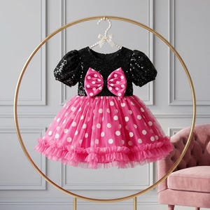 black and white polka dot dress with pink accessories Can't get enough of this black and white polka dot dress from Cato! Added a  pop of red with my bag and shoes for the perfect spring look. Ready for  Easter and
