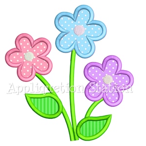 May include: Three embroidered flowers with white polka dots on a white background. The flowers are pink, blue, and purple. The flowers have green stems and leaves with white stripes.
