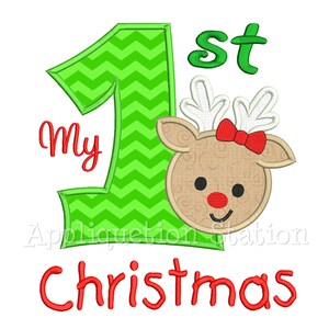 May include: Green and white chevron number one with the word "My" in red cursive to the left of the number. A brown reindeer face with a red bow is to the right of the number. The word "1st" is in green above the reindeer. The word "Christmas" is in red below the number.