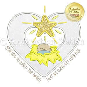 May include: A white heart with a gold star and a baby Jesus in a manger. The text "For God so loved the world that He gave His only Son" is written around the heart.