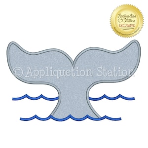 May include: A grey whale tail with blue waves, an applique design. The design is labelled "Appliquetion Station Exclusive".