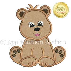 May include: A brown teddy bear applique design with a pink tongue sticking out. The bear is sitting with its paws in front of it. The design is perfect for embroidery projects.