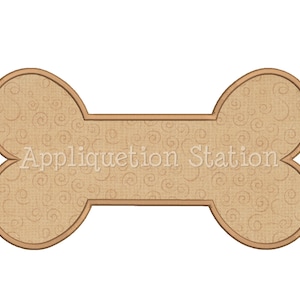 May include: A brown dog bone-shaped applique with a swirl pattern and the text "Appliquation Station" in the center.