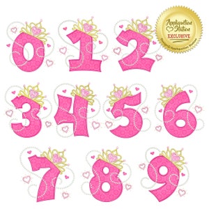 May include: Pink princess-themed numbers 0-9 with gold crowns and pearl accents. Each number is surrounded by hearts and pearls.