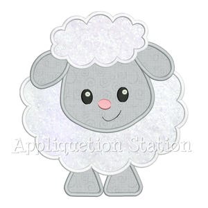 May include: A cute cartoon sheep with a fluffy white body and head, gray face, ears, and feet. The sheep has a pink nose, black eyes, and a smiling mouth. The text "Appliquetion Station" is printed below the sheep.