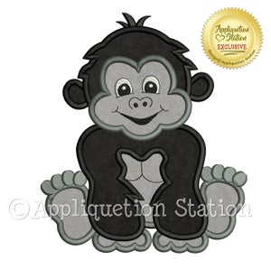 May include: A black and gray cartoon gorilla sitting with its arms crossed and a big smile. The gorilla has large, round eyes and a gray nose. The image is a digital embroidery design.