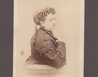 Profile CDV of a Woman with a Beautiful Dress and Unusual Hairdo