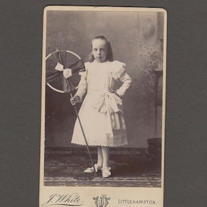CDV of a Beautifully Dressed Little Girl Holding a Fancy Staff
