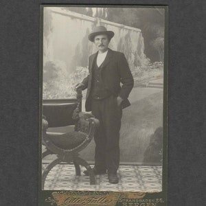 Norwegian CDV of a Man in Front of an Elaborate Backdrop