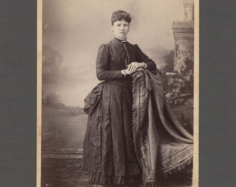 Cabinet Card of a Well-Dressed and Accessorized Young Woman ~ Elaborate Backdrop