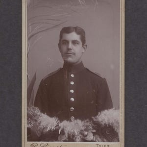 Interesting CDV of a German Soldier Framed by Flowers
