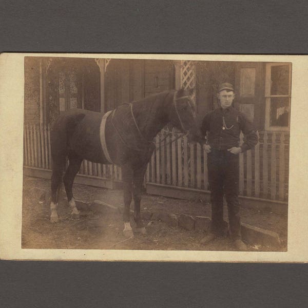 Cabinet Card of a Young Man Posing with his Horse